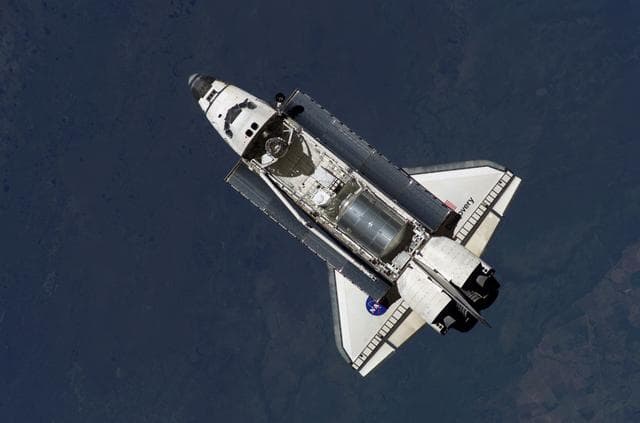 NASA image: Discovery approaching the ISS for docking during the STS-121 mission