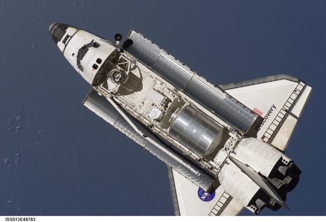 NASA image: Discovery approaching the ISS for docking during the STS-121 mission