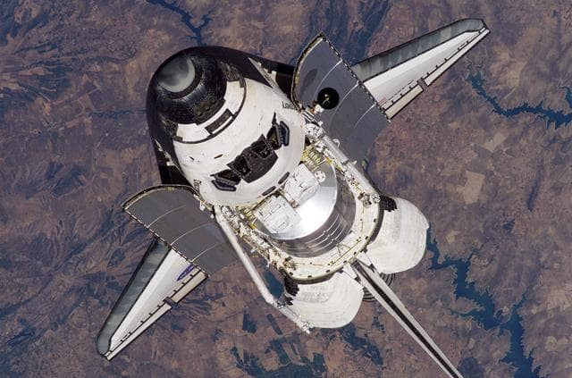 NASA image: Discovery approaching the ISS for docking during the STS-121 mission