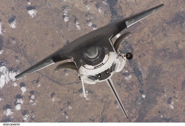 NASA image: Discovery approaching the ISS for docking during the STS-121 mission