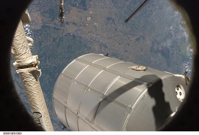 NASA image: Transfer of the MPLM Leonardo from the ISS to the Orbiter Discovery Payload Bay