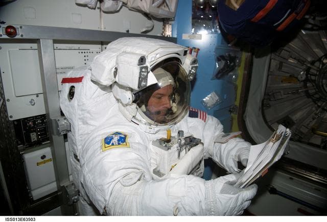 NASA image: Williams in the Quest/Airlock during Expedition 13