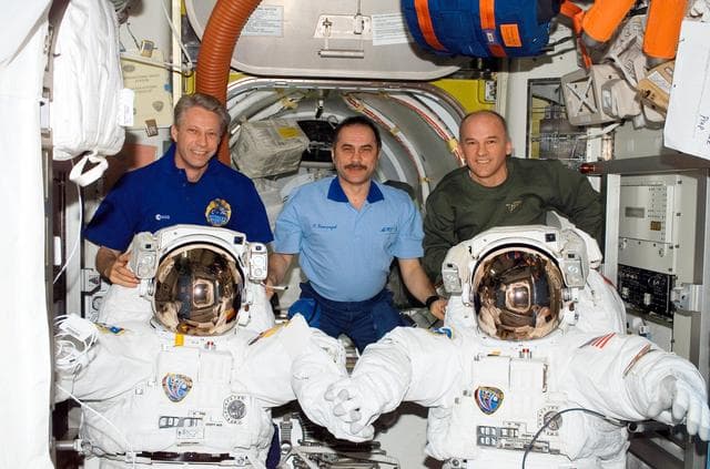 NASA image: Crewmembers pose in the Quest A/L during Expedition 13