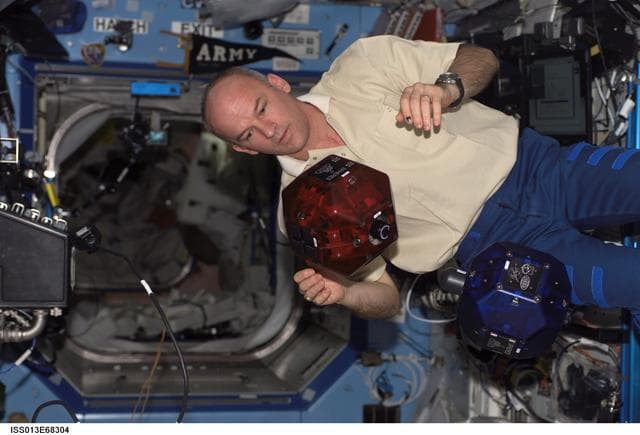NASA image: Williams checks SPHERES in the U.S. Laboratory during Expedition 13
