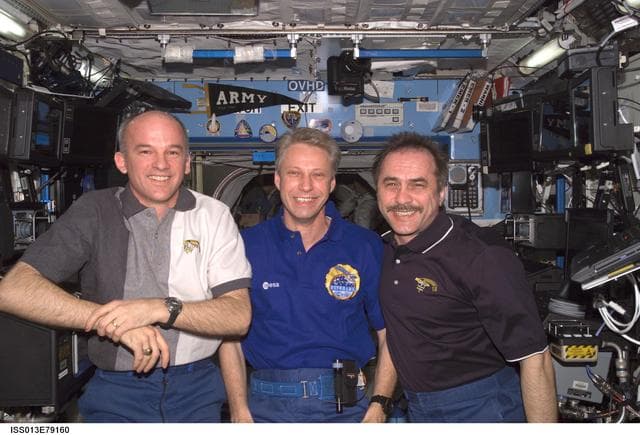 NASA image: Expedition 13 Crew poses for portrait in the U.S. Laboratory