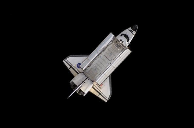 NASA image: View of Orbiter Atlantis after undocking from the ISS during Expedition 13