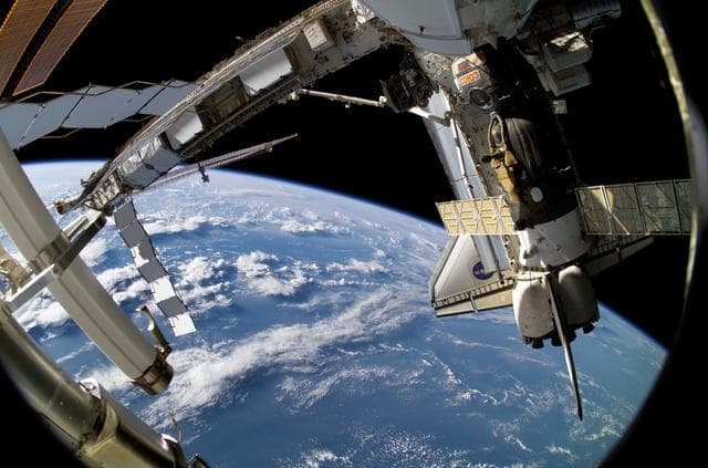 NASA image: FGB, Soyuz Spacecraft, PMA-3, and the Orbiter Atlantis during Expedition 13