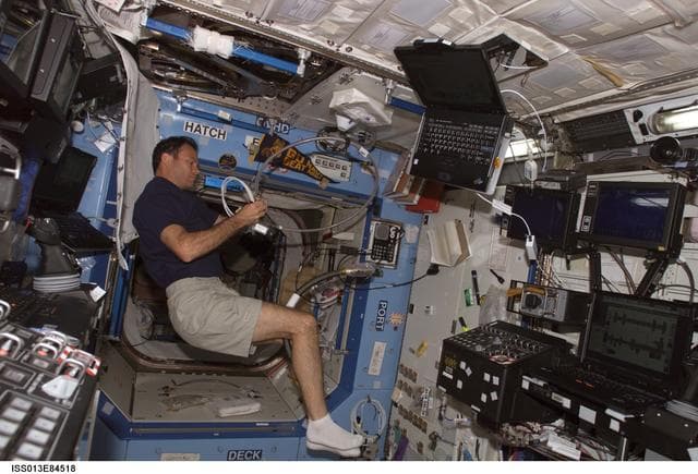 NASA image: Lopez-Alegria at work in the U.S. Laboratory