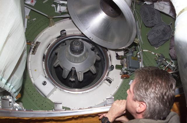 NASA image: Crew around hatch leading into the Soyuz spacecraft