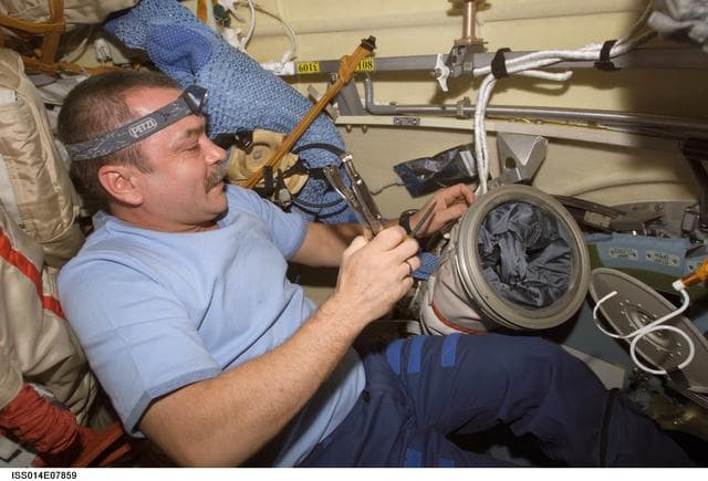 NASA image: Inspection of Russian Orlan Space Suit in the Pirs module prior to Russian EVA
