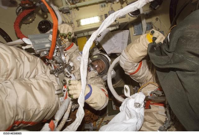 NASA image: Tyurin and Lopez-Alegria conduct Orlan Translation Exercise in DC1