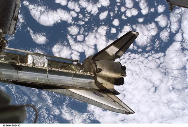 NASA image: Discovery docked to ISS during STS-116 mission