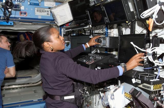 NASA image: Higginbotham at SSRMS controls in Destiny laboratory