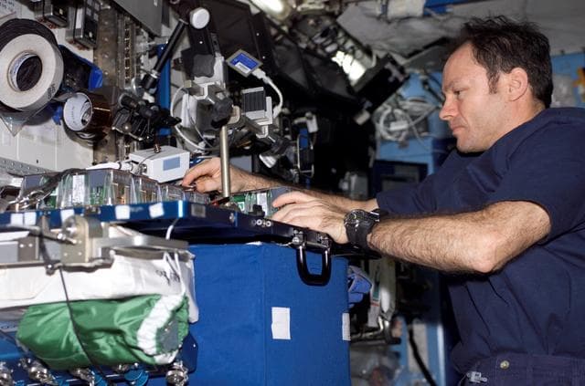 NASA image: Lopez-Alegria performs EMCS-EC replace activity in Destiny laboratory module
