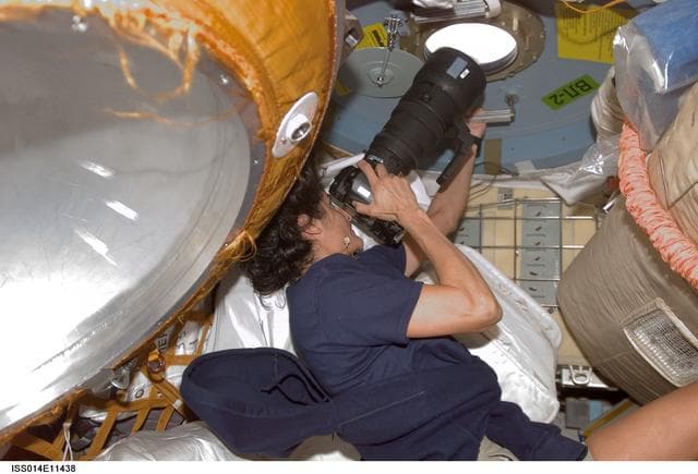 NASA image: Williams with camera in the Pirs Docking Compartment (DC1).