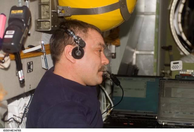 NASA image: Tyurin in Zvezda with communication system