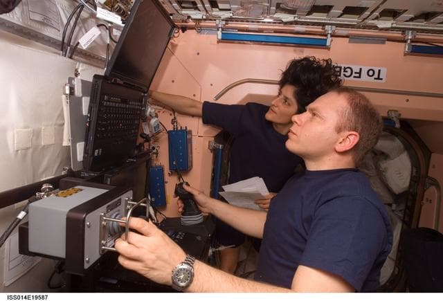 NASA image: Kotov and Williams with SSRMS arm training session in Node 1 / Unity module