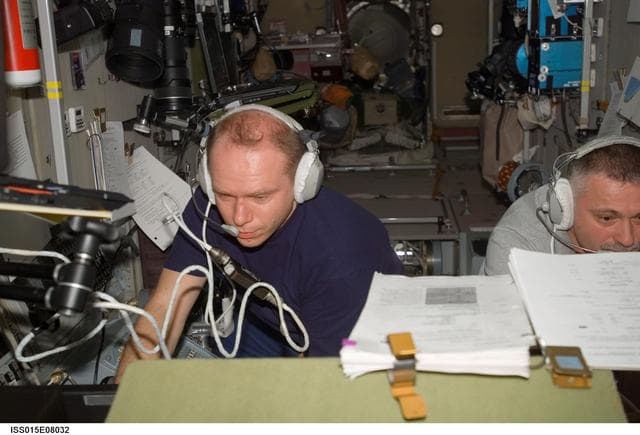 NASA image: Yurchikhin and Kotov during docking procedures for a Progress Spacecraft