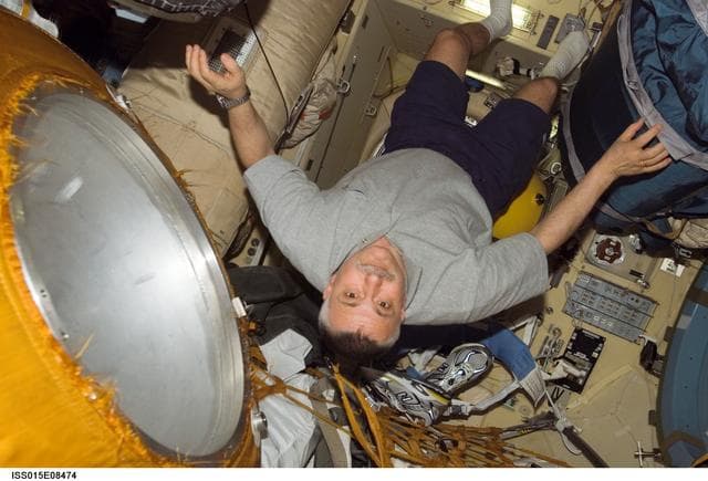 NASA image: Yurchikhin poses for a photo in the DC1 during Expedition 15