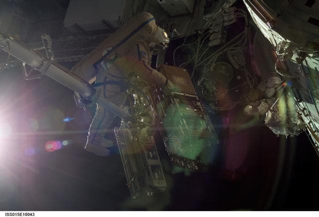 NASA image: View of Kotov working with Debris Panels during EVA18