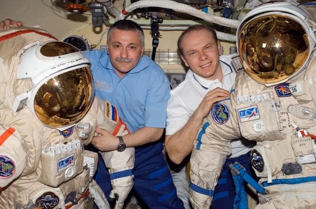 NASA image: Yurchikhin and Kotov pose for a photo in the DC1 during Expedition 15