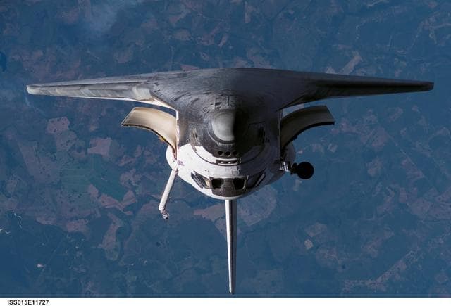 NASA image: Atlantis and Payload on approach to the ISS during the STS-117 Mission