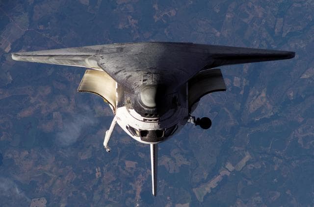 NASA image: Atlantis and Payload on approach to the ISS during the STS-117 Mission