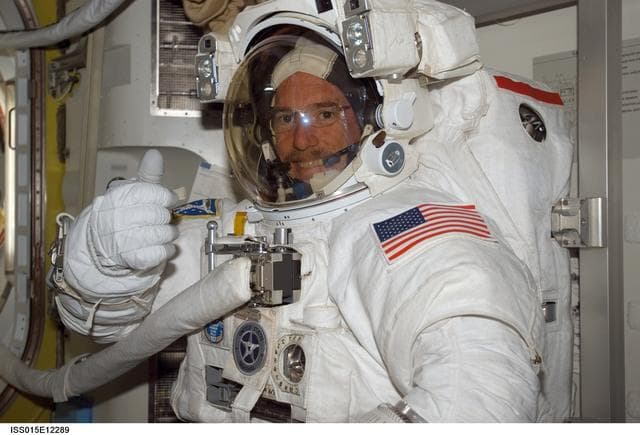 NASA image: View of Reilly posing for a photo in the A/L during STS-117/Expedition 15 Joint Operations