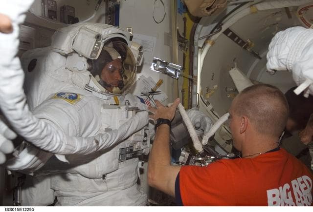 NASA image: View of crew preparing for EVA3 in the A/L during STS-117/Expedition 15 Joint Operations