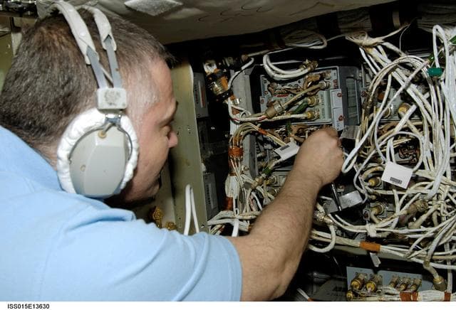 NASA image: View of Yurchikhin working on Regul-OS System Hardware in the SM during Expedition 15