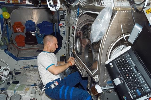 NASA image: Anderson during a MSG Leak Test in the US Lab during Expedition 15