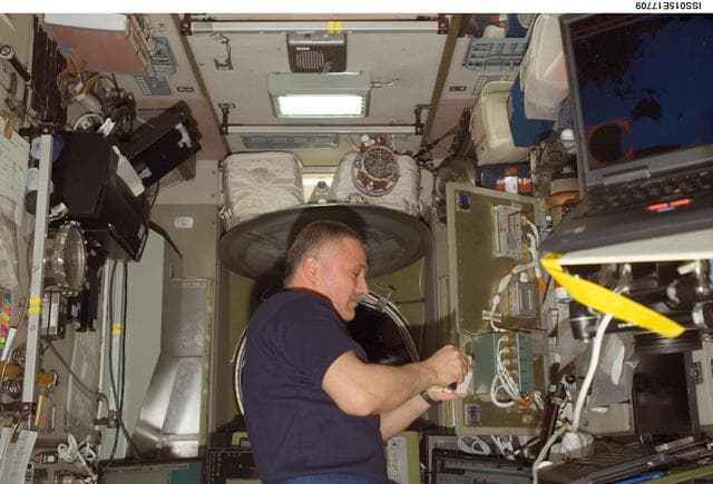 NASA image: View of Yurchikhin working on SMCC2 Command Processing Unit during Expedition 15