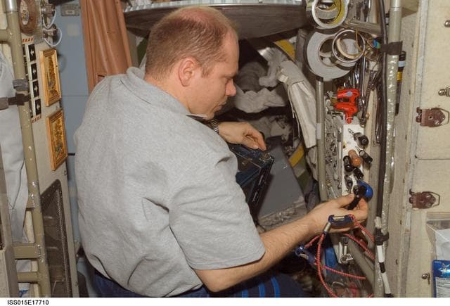NASA image: View of Kotov installing LADA-MIS Hardware in the SM during Expedition 15