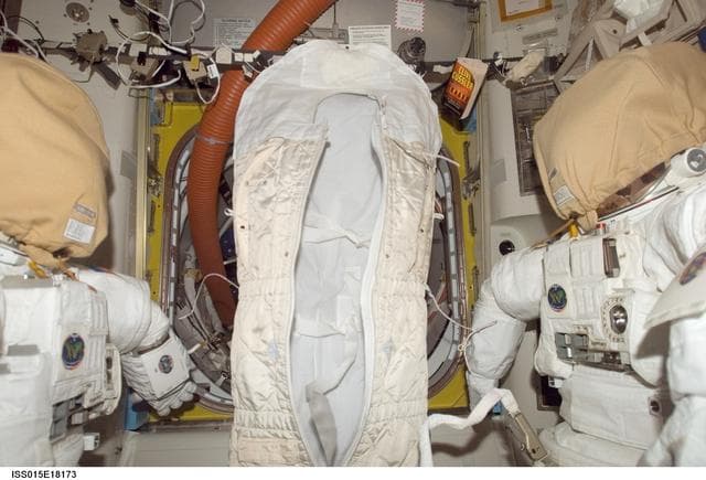 NASA image: View of a Sleeping Bag and EMUs in the A/L during Expedition 15