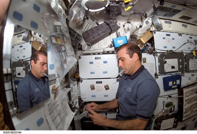 NASA image: Mastracchio prepares meal in the FWD MDDK on Space Shuttle Endeavour