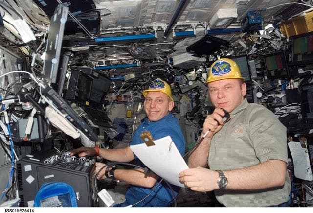 NASA image: View of Anderson and Kotov working in the US Lab during Expedition 15