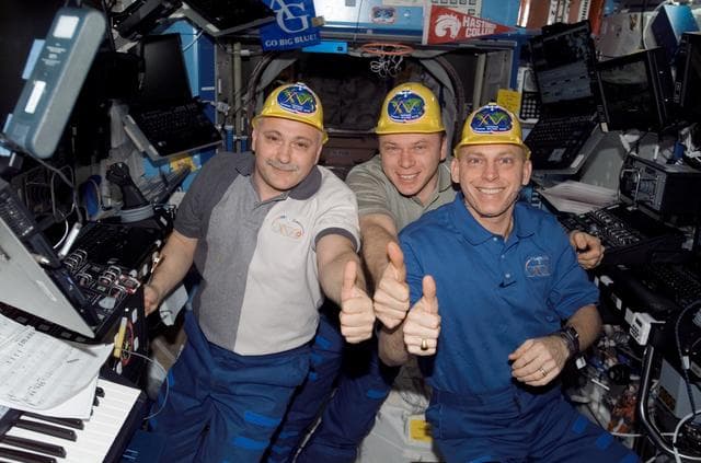 NASA image: View of Crew posing for a photo in the US Lab during Expedition 15