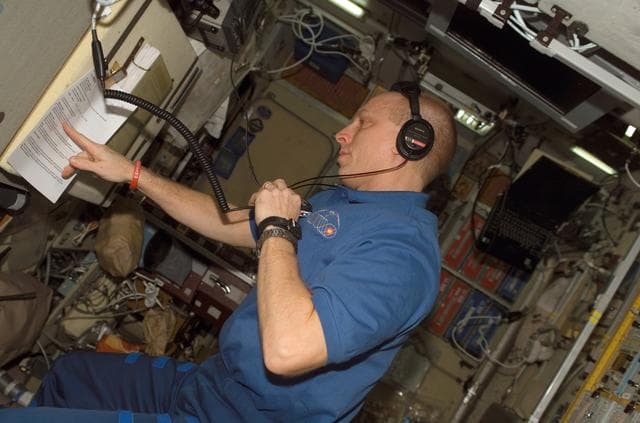 NASA image: Anderson prepares for a HAM Radio session in the SM