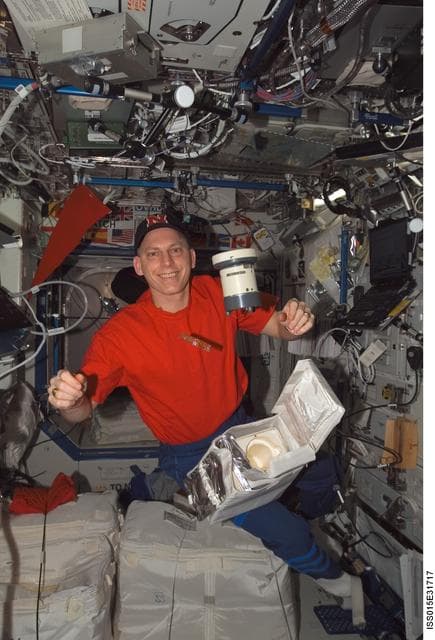 NASA image: Anderson gathers air samples in the US Lab during Expedition 15