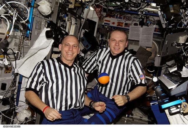NASA image: Anderson and Kotov posing for a photo in the US Lab during Expedition 15
