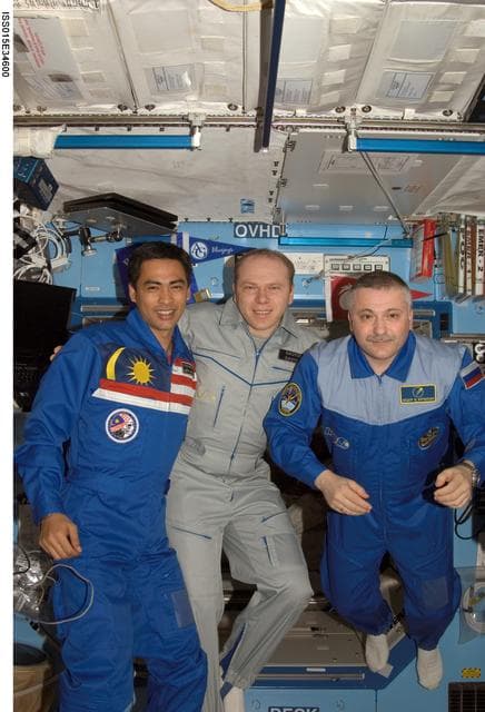 NASA image: Expedition 15 Crewmembers and Spaceflight Participant pose for a photo in the US Lab