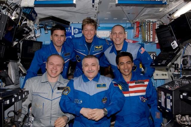 NASA image: Expedition 15 and Expedition 16 Crewmembers pose for a photo in the US Lab