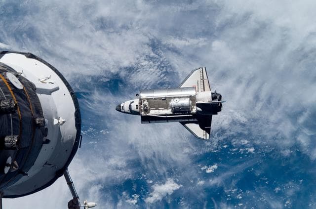 NASA image: Discovery and Payload on approach to the ISS during the STS-120 Mission