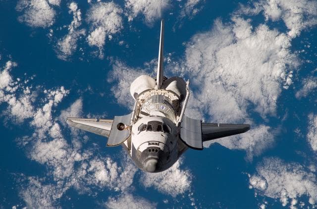 NASA image: Discovery and Payload on approach to the ISS during the STS-120 Mission