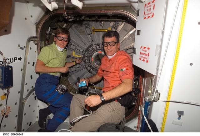 NASA image: Whitson and Nespoli prepare to open Node 2 hatch