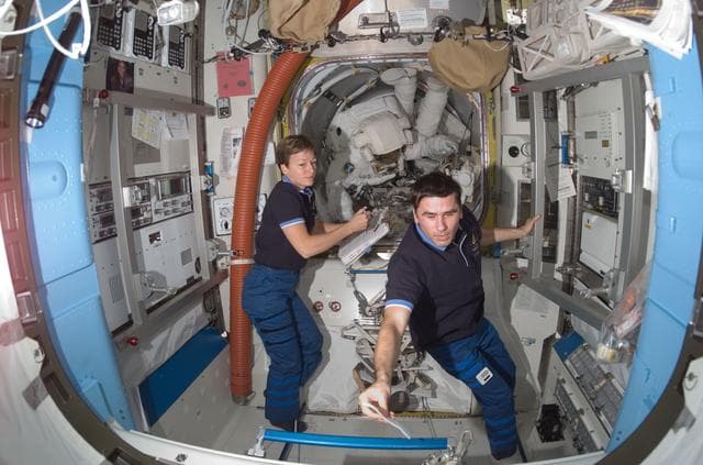 NASA image: Whitson and Malenchenko in the A/L prior to Expedition 16 / STS-120 EVA 4