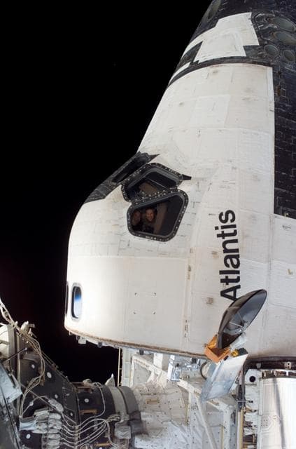 NASA image: Poindexter and Frick on docked Atlantis