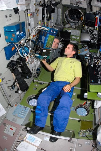 NASA image: Malenchenko checks Lada Greenhouse in SM