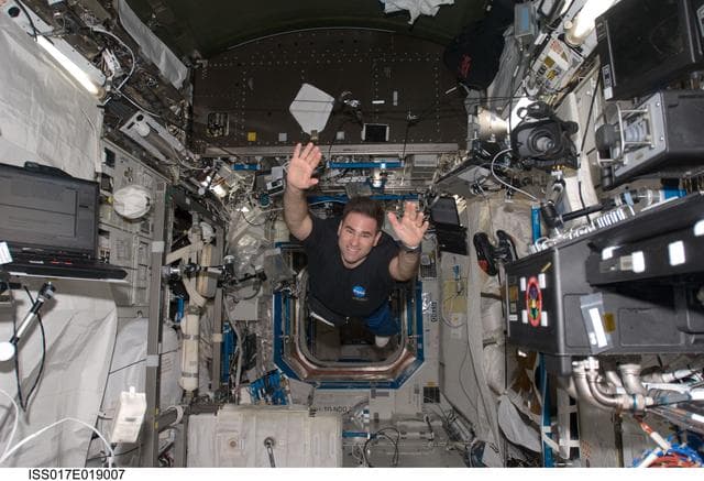 NASA image: Chamitoff floats in the U.S. Laboratory during Joint Operations