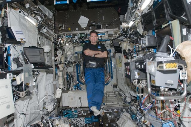 NASA image: Chamitoff floats in the U.S. Laboratory during Joint Operations